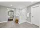 This bathroom features a glass shower enclosure with white subway tile and a gray tile floor at 410 Dalrymple Ne Rd, Atlanta, GA 30328