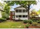 Charming home featuring a spacious backyard with a two-story screened porch, ideal for enjoying the outdoors at 492 Clifton Ne Rd, Atlanta, GA 30307