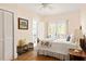 Calm bedroom with a full size bed and access to a balcony at 492 Clifton Ne Rd, Atlanta, GA 30307