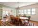 Elegant dining room showcasing hardwood floors and a large dining table at 492 Clifton Ne Rd, Atlanta, GA 30307