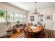 Bright dining room featuring hardwood floors and a large dining table at 492 Clifton Ne Rd, Atlanta, GA 30307