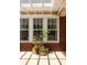 Exterior of house featuring brick accents, white trim, and mature landscaping at 492 Clifton Ne Rd, Atlanta, GA 30307