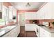 Well-lit kitchen features new appliances and white cabinetry with plenty of storage at 492 Clifton Ne Rd, Atlanta, GA 30307