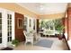 Inviting outdoor porch with comfortable seating and a tranquil ambiance at 492 Clifton Ne Rd, Atlanta, GA 30307