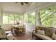 Bright sunroom with large windows, perfect for relaxing and enjoying the outdoors at 492 Clifton Ne Rd, Atlanta, GA 30307