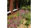 Vibrant flowerbeds enhance the beauty of the charming exterior at 492 Clifton Ne Rd, Atlanta, GA 30307