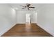 Bright bedroom features hardwood floors, a ceiling fan, and ample natural light at 51 Queen Anne Se Dr, Mableton, GA 30126