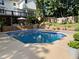 Backyard featuring an inviting in-ground pool and patio space perfect for entertaining at 51 Queen Anne Se Dr, Mableton, GA 30126