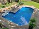 In-ground pool with patio and landscaped backyard, perfect for relaxation and entertainment at 51 Queen Anne Se Dr, Mableton, GA 30126