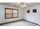 Bright bedroom featuring white walls, neutral carpet, natural light, and neutral trim at 203 Leigh Dr, Ellenwood, GA 30294