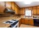 Functional kitchen area with ample counter space and essential appliances at 203 Leigh Dr, Ellenwood, GA 30294