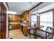 Cozy kitchen nook with a table by a large bay window, providing ample natural light at 203 Leigh Dr, Ellenwood, GA 30294