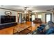 Spacious living room with stylish decor, hardwood floors, and an open layout at 203 Leigh Dr, Ellenwood, GA 30294