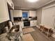 Modern kitchen with white cabinets, stainless steel appliances, and granite countertops at 455 Lynch Nw Ave, Atlanta, GA 30318