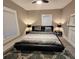 Cozy main bedroom with warm accents and abundant natural light at 455 Lynch Nw Ave, Atlanta, GA 30318