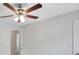 Well-lit bedroom with carpet flooring and a modern ceiling fan at 4788 Rock Island Nw Ln, Acworth, GA 30102