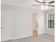 Comfortable bedroom includes ensuite bathroom and carpeting at 4788 Rock Island Nw Ln, Acworth, GA 30102