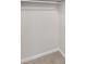 Walk-in closet with rod for hanging and carpet flooring at 4788 Rock Island Nw Ln, Acworth, GA 30102