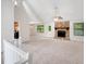 Spacious living room with vaulted ceilings, stone fireplace, neutral carpet and paint at 4788 Rock Island Nw Ln, Acworth, GA 30102
