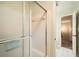 Enclosed shower area with tile surround and glass sliding door at 12 Westchester Square Sq, Decatur, GA 30030