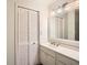 Well-lit bathroom with a marble countertop and storage at 12 Westchester Square Sq, Decatur, GA 30030