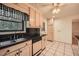 Functional kitchen featuring stainless steel appliances, a sink with a view, and tile flooring at 12 Westchester Square Sq, Decatur, GA 30030