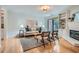 Comfortable living room featuring built-in bookshelves, a fireplace, and hardwood floors at 12 Westchester Square Sq, Decatur, GA 30030