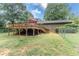 The backyard features a deck that is perfect for entertaining Gathering and friends at 150 Newton Ridge Dr, Covington, GA 30014