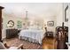 Comfortable bedroom with wood floors, chandelier, and natural light at 1534 September Chase, Decatur, GA 30033