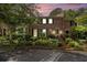 Beautiful brick townhome with shutters and manicured front yard landscaping at 1534 September Chase, Decatur, GA 30033