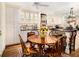 Bright kitchen with white cabinets, hardwood floors, and a breakfast nook at 1534 September Chase, Decatur, GA 30033