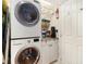 Convenient laundry room features stacked washer/dryer and cabinet space at 1534 September Chase, Decatur, GA 30033