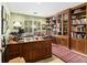 Home office featuring beautiful wooden shelving, built-in bookcases, and large desk at 1534 September Chase, Decatur, GA 30033