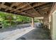 Outdoor parking featuring lush landscaping, room for multiple cars, and a brick wall at 1534 September Chase, Decatur, GA 30033