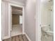 Well-lit bathroom featuring a white toilet and shower-tub combo at 1634 Ponce De Leon Ave # 107, Atlanta, GA 30307