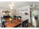 Dining room featuring stylish decor, a hardwood floor, and a peek into a modern kitchen at 1634 Ponce De Leon Ave # 107, Atlanta, GA 30307