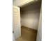 An empty closet with shelving provides ample storage space at 905 Park Ne Pl, Conyers, GA 30012