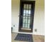 Exterior shot showing the front door with welcome mat at 905 Park Ne Pl, Conyers, GA 30012