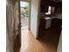 View of kitchen with wood cabinets, a sink, and access to the deck at 905 Park Ne Pl, Conyers, GA 30012