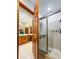 Bathroom featuring single sink vanity, a shower behind sliding glass doors at 110 The Farm Rd, Mcdonough, GA 30252