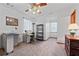 Spacious bedroom featuring a desk area for office work or hobbies at 110 The Farm Rd, Mcdonough, GA 30252