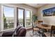 Bright breakfast nook boasts skyline views and access to the outdoor balcony at 1195 Milton Ter # 1304, Atlanta, GA 30315