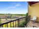 Relaxing balcony with a view of the neighborhood, featuring comfortable seating at 1195 Milton Ter # 1304, Atlanta, GA 30315