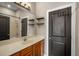 Bathroom featuring cherry wood cabinets and shelving at 1195 Milton Ter # 1304, Atlanta, GA 30315