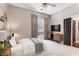 Modern bedroom with a TV, contemporary furniture, and a neutral color scheme at 1195 Milton Ter # 1304, Atlanta, GA 30315