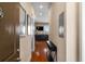 Inviting hallway leading to a bright living area with hardwood floors and stylish decor at 1195 Milton Ter # 1304, Atlanta, GA 30315