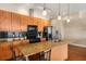 Gourmet kitchen featuring stainless steel appliances, granite countertops, and hardwood floors at 1195 Milton Ter # 1304, Atlanta, GA 30315