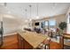 Open living space featuring a gourmet kitchen, a cozy living area, and balcony at 1195 Milton Ter # 1304, Atlanta, GA 30315