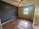 The bedroom features wood floors and a window at 4009 Ester Sw Dr, Atlanta, GA 30331