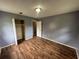 This bedroom features hard wood floors, closet, base molding, and a neutral color to add your own style at 4009 Ester Sw Dr, Atlanta, GA 30331